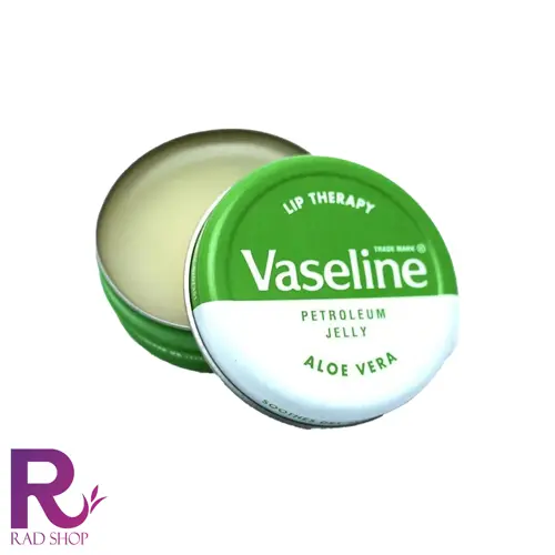 بالم لب کاسه ای وازلین، قوطی گرد سبز باز با بالم روشن و در سبز و سفید با نوشته ALOE VERA، روی زمینه سفید